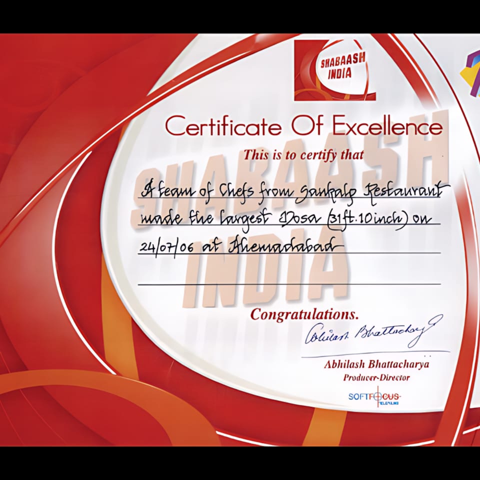 A Certificate of Excellence from Shabaash India for making the largest Dosa.