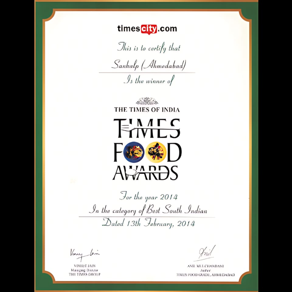 A Times Food Awards certificate from 2014, recognizing Sankalp (Ahmedabad) for Best South Indian cuisine.